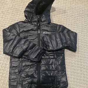 NWOT-Kids hooded black Columbia jacket never worn. Size 10/12